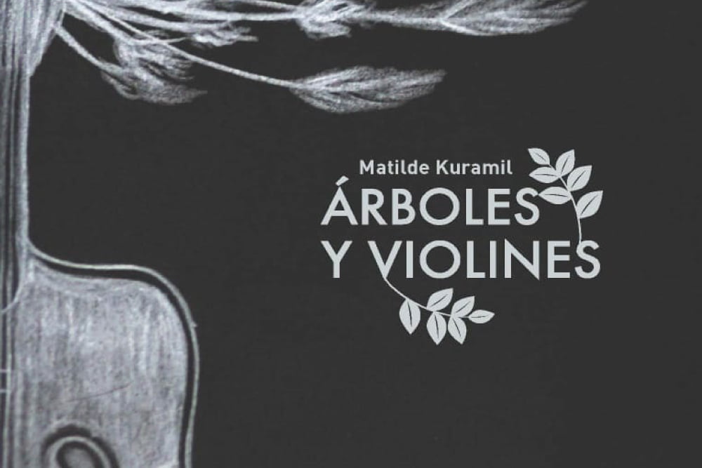 Foto de portada de un libro, aparece un violin y un arbol