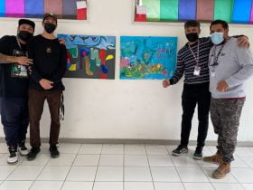 Foto de artistas de bajos de mena en comunidad educativa rigoberta menchú